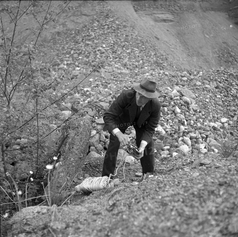 Schoeftland gravel pit, shot firer detonating explosive; 1955.