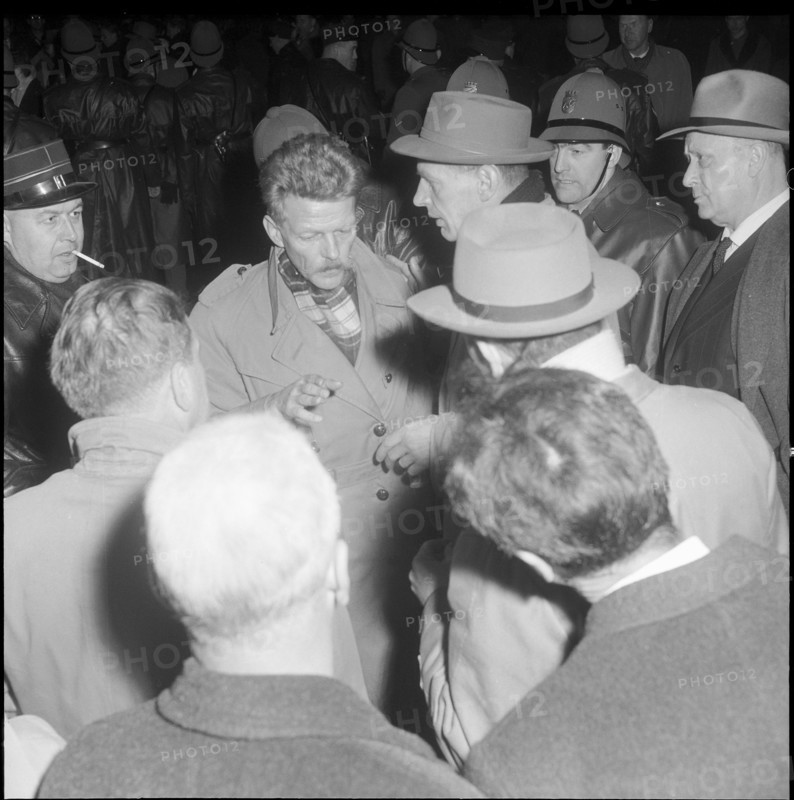 Demonstraters hinder invited guests; Armand Forel, police protection; 1961.