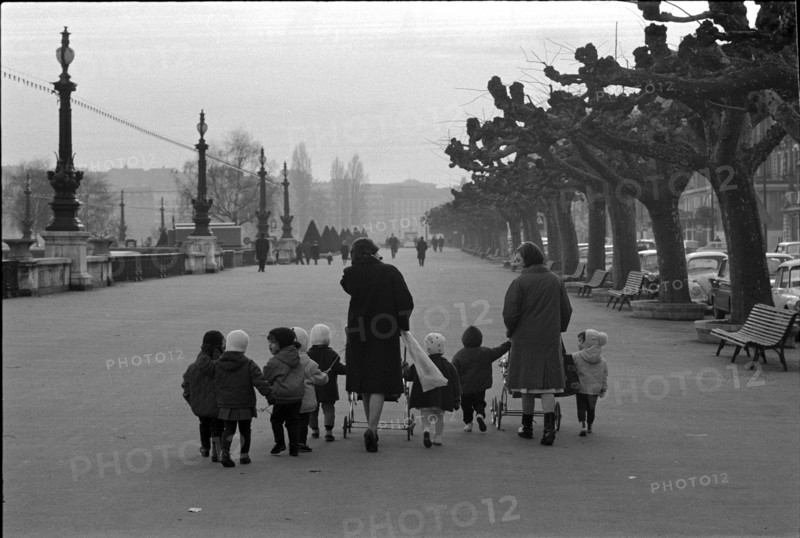 Women with little children at the lake promenade in Geneva, 1967.