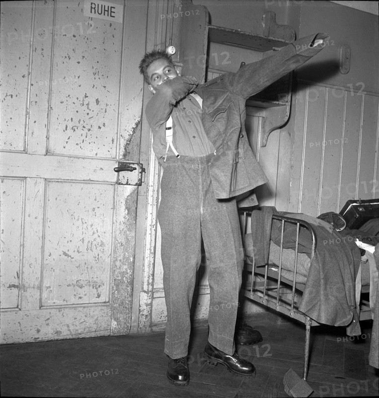 Recruit Getting Dressed, 1952.