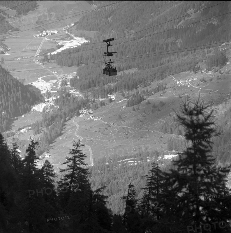 Persons in freight ropeway, Brigaglia 1957.