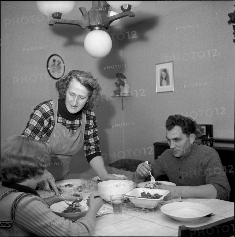 Family at Dinner, 1954.