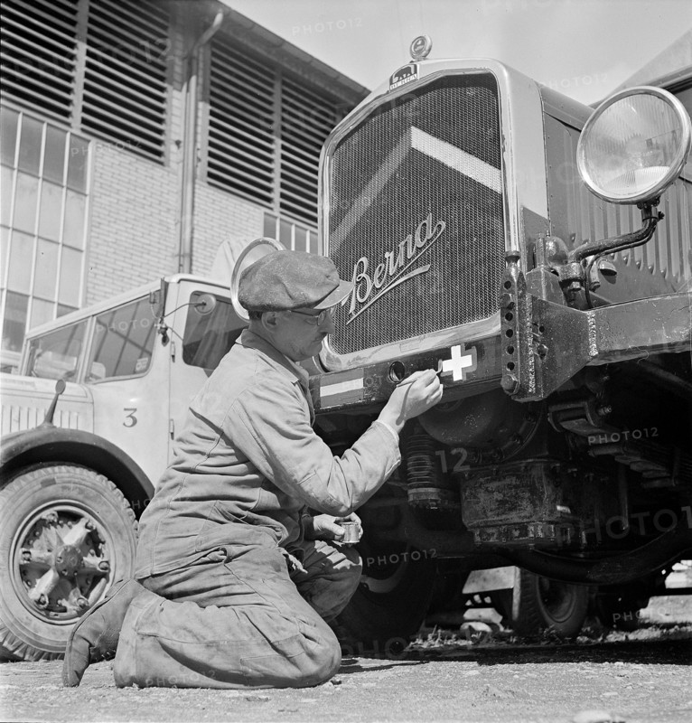 Spanish and Swiss national flag are painted on truck rear ; 1944.