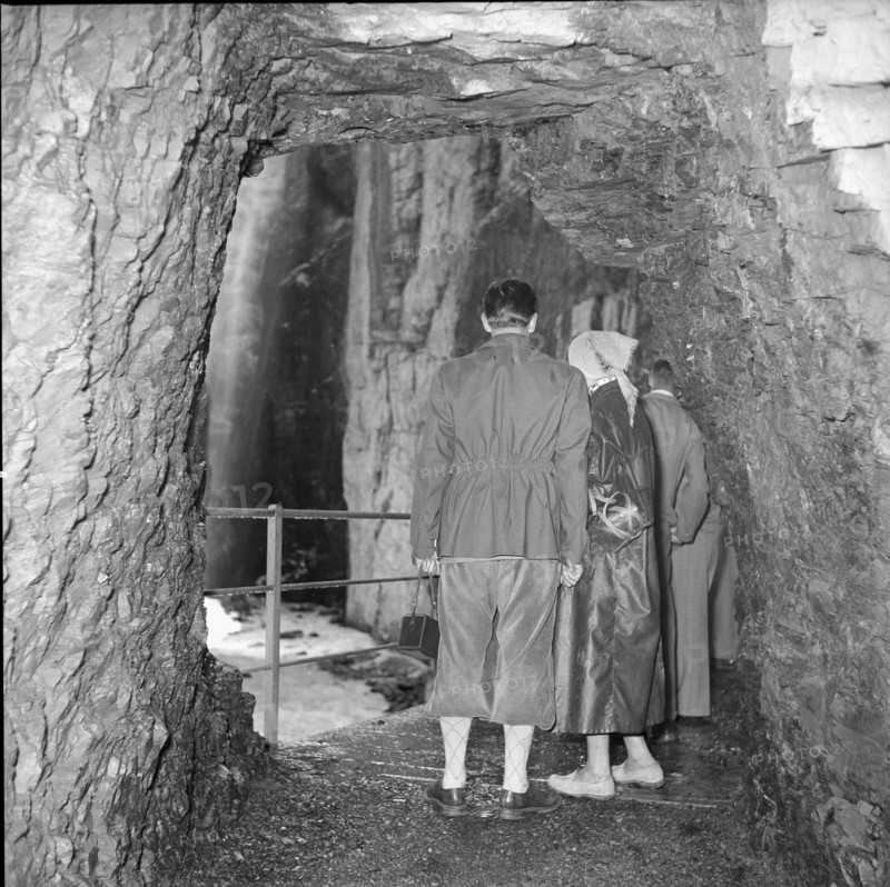 Visitors in Glacier ravine in Grindelwald, 1953.
