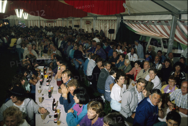 Visitors in the pavilion at the Älpler musical request programme, Urnerboden 1993.