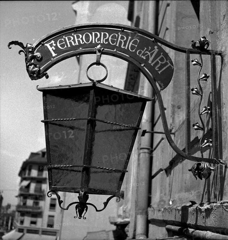 Geneva: wrought-iron shop sign of an artist blacksmith; 1943.
