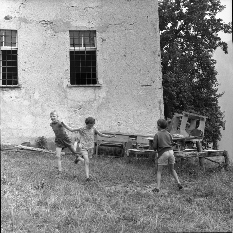 Children playing in Indemini, ; 1960.