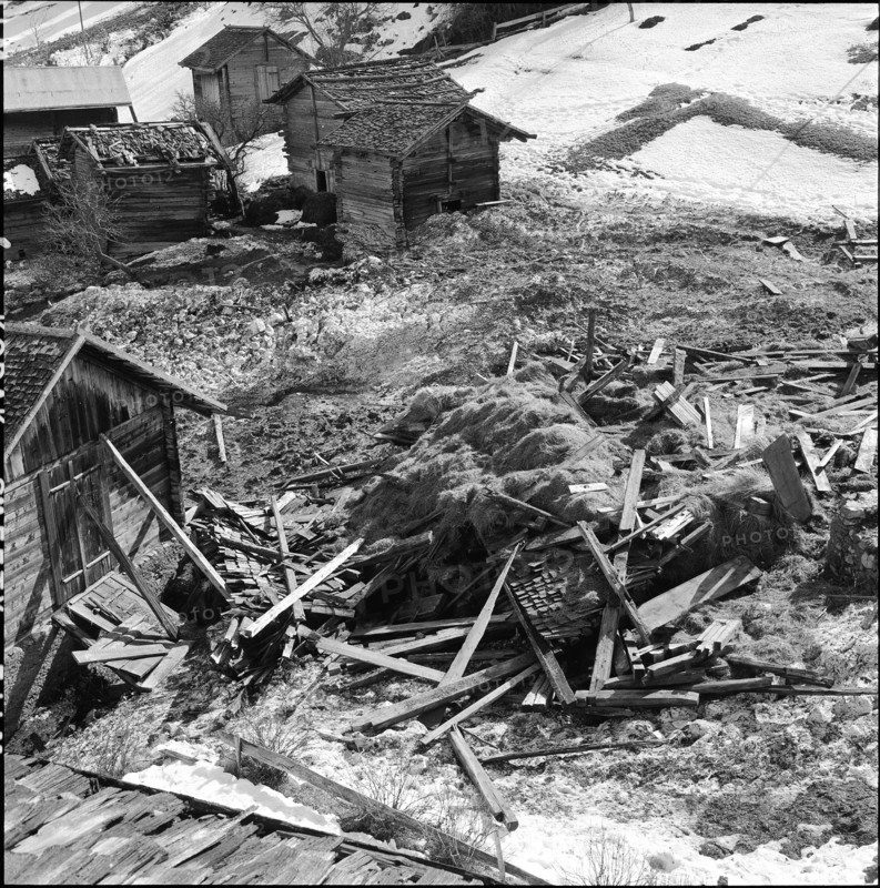 Avalanche in Unterbäch; destroyed little storehouses, 1957.