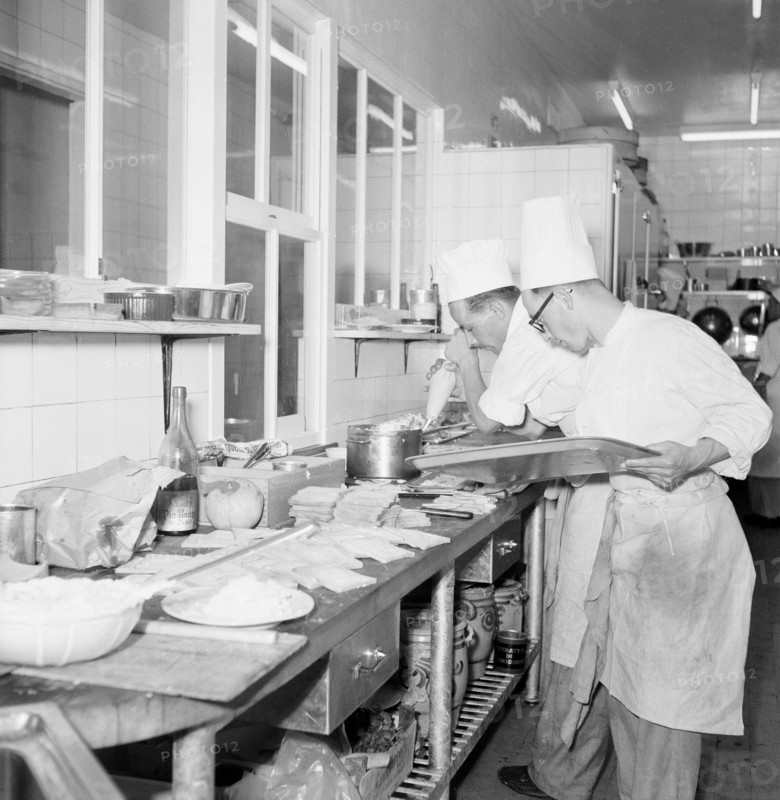 Geneva 1950: Cooks cooking in the kitchen of the du Rhone hotel.
