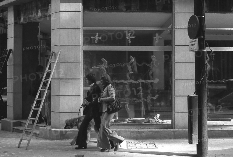 1975, Paris, Rive droite, couple with Afghan Hound dog.