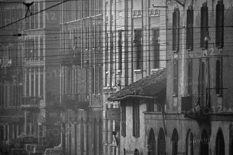 1975, Milan, Navigli in fog.
