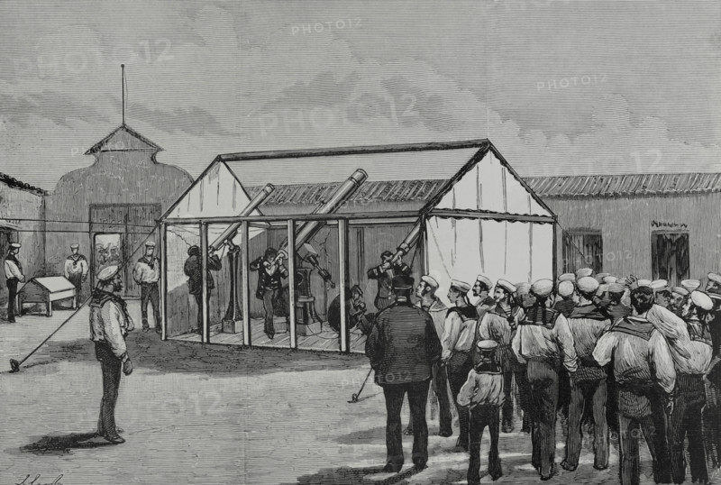 Manzanillo, Cuba. The Spanish scientific commission observing the passage of Venus through the solar disk, on 6 December 1882, under the presidency of the director of Royal Institute and Observatory of the Spanish Navy (Real Instituto y Observatorio de la Armada de San Fernando, Spain), Mr. Cecilio Pujazon (1833-1891). A provisional observatory was installed in the courtyard of the military hospital, at the Plaza del Fuerte, by the sea. This observatory consisted of a hut without roof, in which were placed three equatorial telescopes, one chronograph and three chronometers. Drawing by Juan Comba. Engraving by Rico. La Ilustracion Espanola y Americana (The Spanish and American Illustration), 1883.