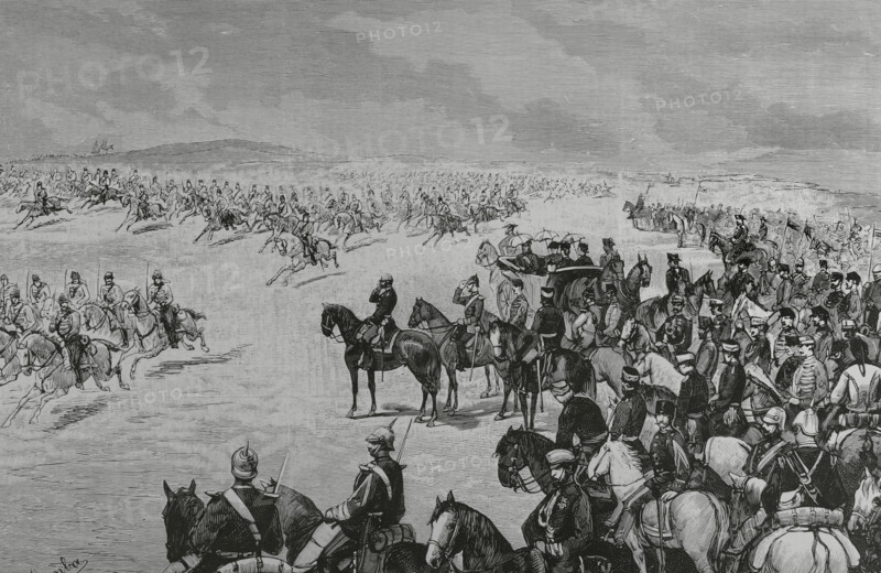 Madrid, Spain. Cavalry maneuvers in the fields of Carabanchel. On 31 January 1883 ended the military exercises in honor of Prince Ludwig Ferdinand of Bavaria, fiance of Infanta Maria de la Paz of Spain. A cavalry division paraded in column of honor and at gallop before King Alfonso XII, the Bavarian prince and the infante Don Antonio. Drawing by Juan Comba. Engraving by Tomas Carlos Capuz (1834-1899). La Ilustracion Espanola y Americana (The Spanish and American Illustration), 8 February 1883.