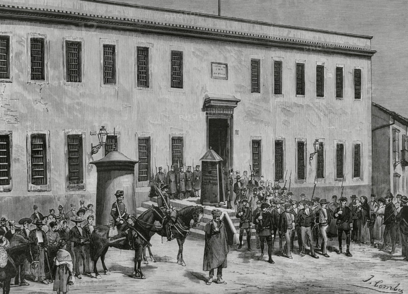 Jerez de la Frontera, province of Cadiz, Andalusia, Spain. Transfer of prisoners from the prison of Jerez de la Frontera to the Cadiz jail. Jerez prison had been a former convent of friars. Converted into a jail, it housed hundreds of prisoners in poor conditions, alleged perpetrators and co-perpetrators of crimes attributed to the anarchist and secret organization called “La Mano Negra” (The Black Hand). This criminal gang acted in Andalusia in 1882 and 1883, amidst class struggle in the Andalusian countryside. The authorities decided to transfer the most dangerous prisoners to the prison of Cadiz. Drawing by Comba. Engraving by Vela. La Ilustracion Espanola y Americana (The Spanish and American Illustration), 1883.