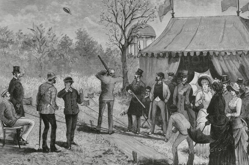 London, England. Bloodless Sport, the Terra-Cotta Pigeon at the Ranelagh Club. A clay blank in the shape of a plate, with a very hard cardboard-stone handle attached to the rim, replaces the pigeon to prevent its death by the practice of this sport. Drawing by Juan Comba. Engraving by Tomas Carlos Capuz (1834-1899). La Ilustracion Espanola y Americana (The Spanish and American Illustration), 1883.