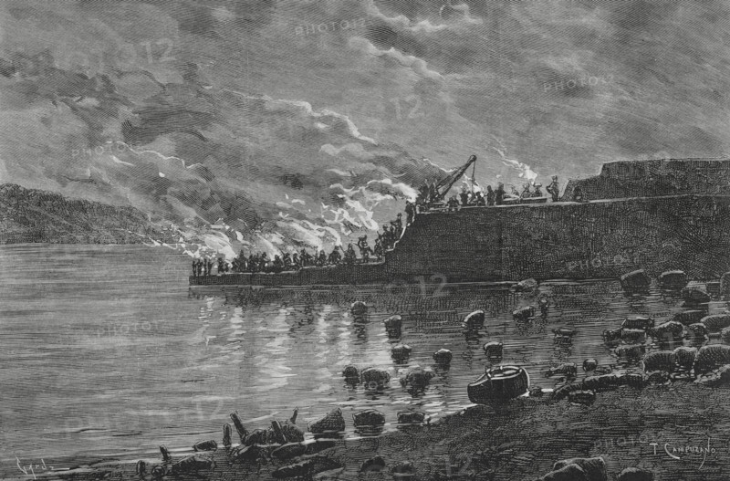 Cudillero, Asturias, Spain. Night work at the construction of the new quay, taking advantage of the low tide. Drawing from life by Tomas Campuzano (1857-1934). Engraving by Tomas Carlos Capuz (1834-1899). The Spanish and American Illustration (La Ilustracion Espanola y Americana). December 15, 1884.