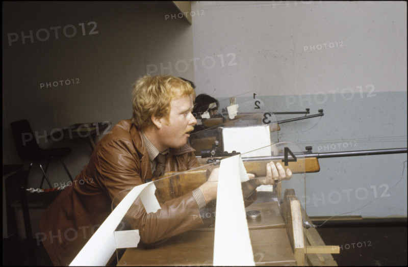 Hans Jucker shooting with small-bore rifle.