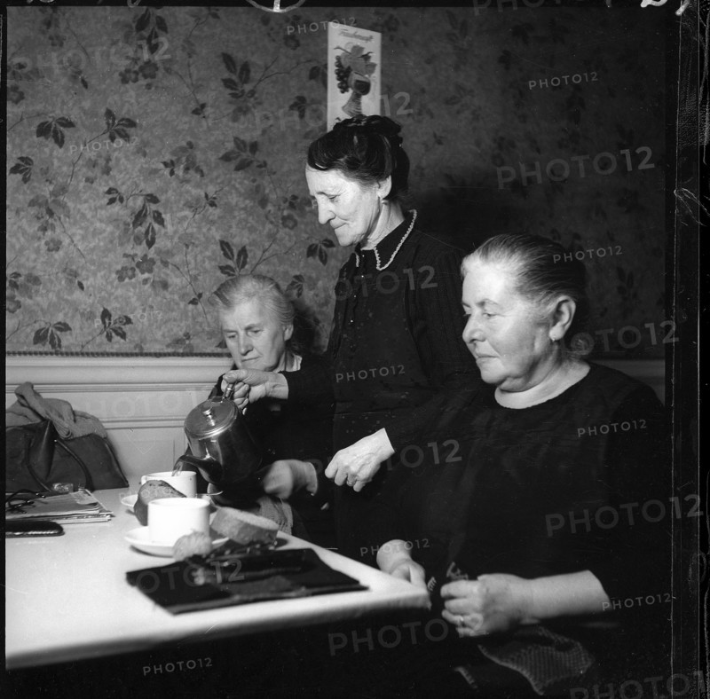 Elderly Women Drinking Coffee.