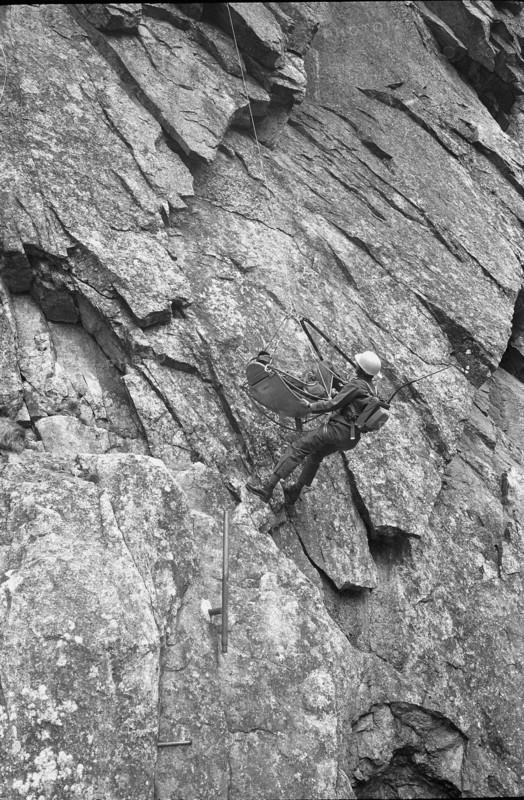 Soldier at rescue training in the rocks, Andermatt 1970.