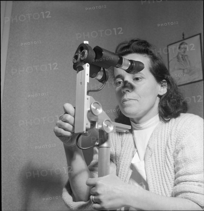 Woman with colposcope for the gynaecological check-up, Geneva 1951.