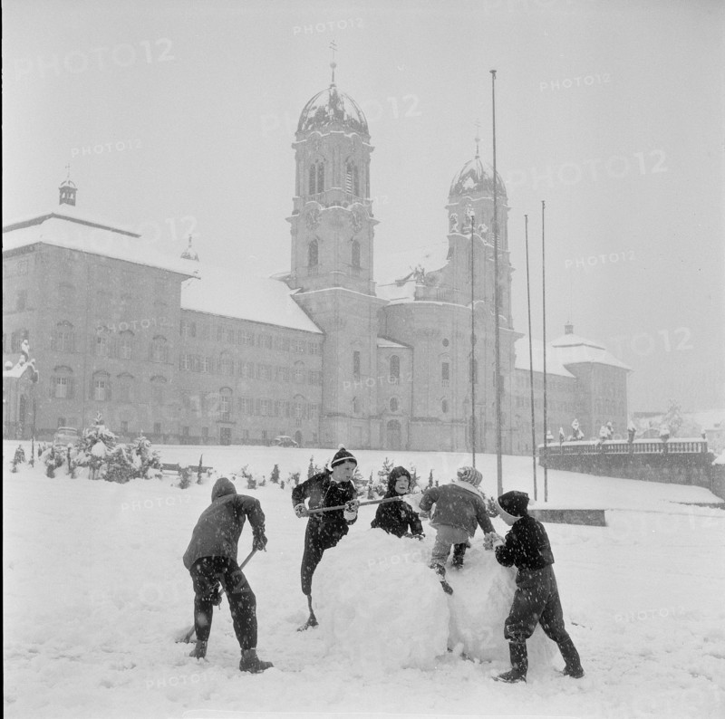 Einsiedeln; children playing in the snow; 1959.