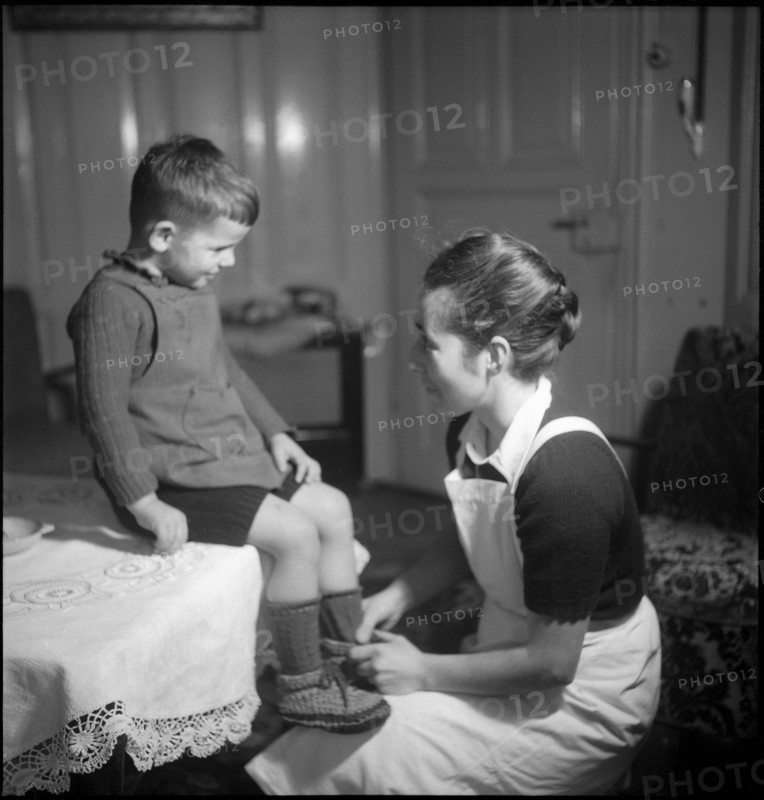 Domestic Servant with Child, around 1963.