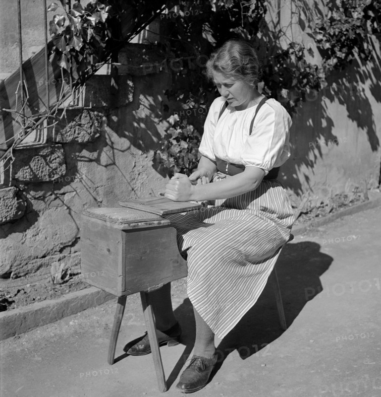 Woman carding wool, 1941.