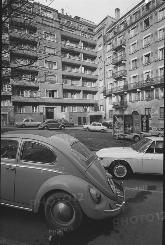 Geneva: billboard and parked cars, Rue Henri  Mussard; 1966.