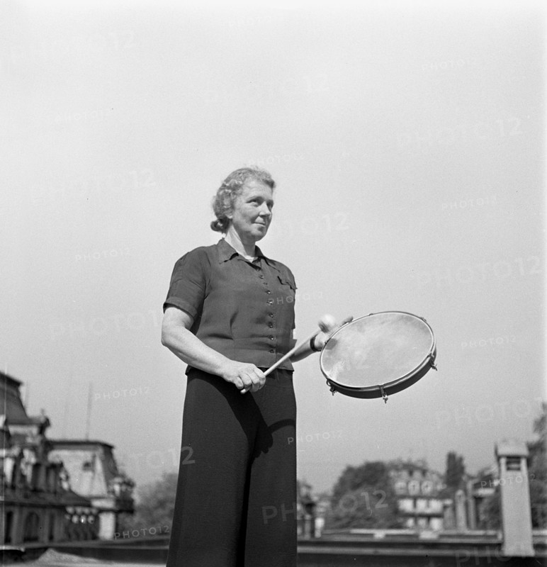 Gymnastics teacher with tambourin; gymnastics school 1940.