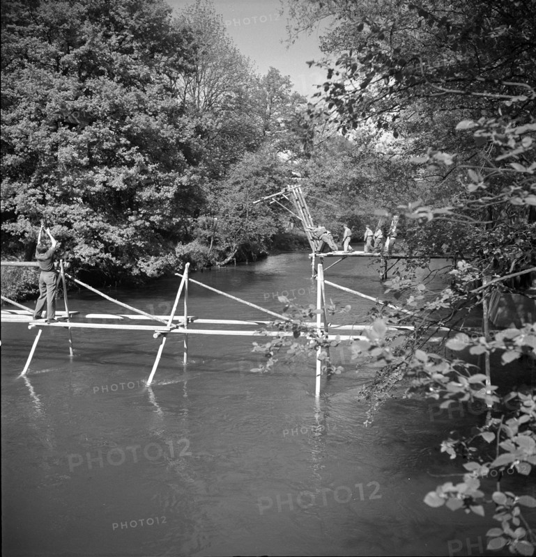 Sappers building bridges across arm of Aare, Brugg 1950.