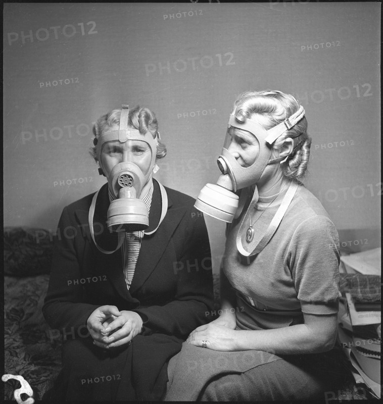 Women with Swiss Gas Masks, 1938.