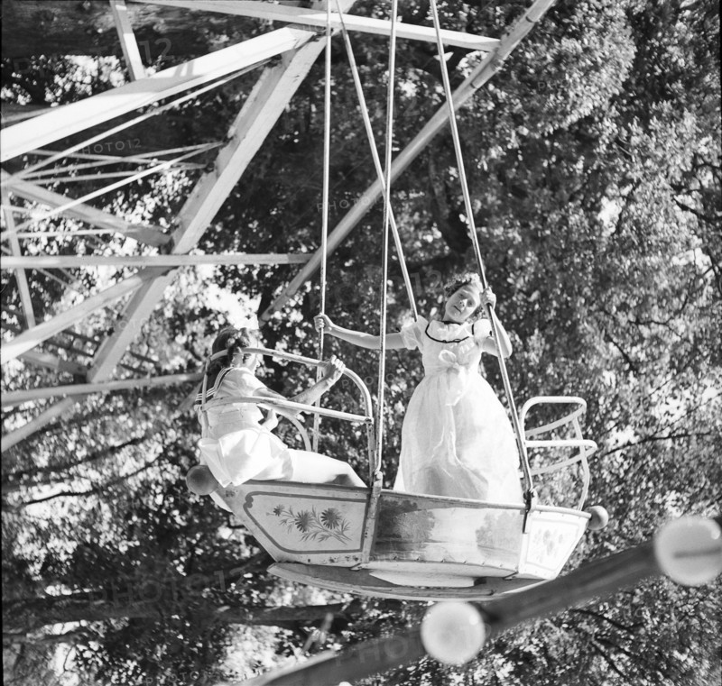 Girls on a fair swing, Lausanne 1942.