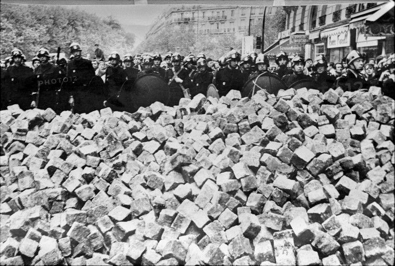 Student riots in Paris 1968: Policemen and paving stones.