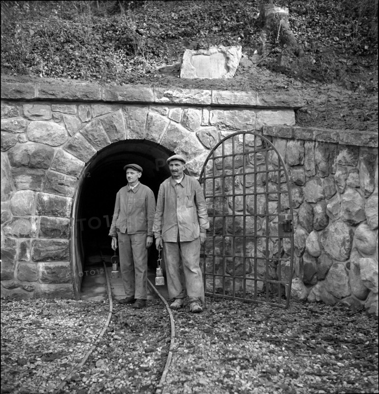 Bex, workers in front of gallery entrance of a salt mine, salt works; 1940.