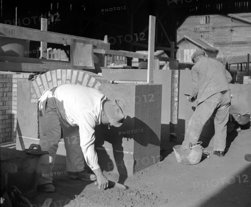 Bricklayer apprentices during their final examination.