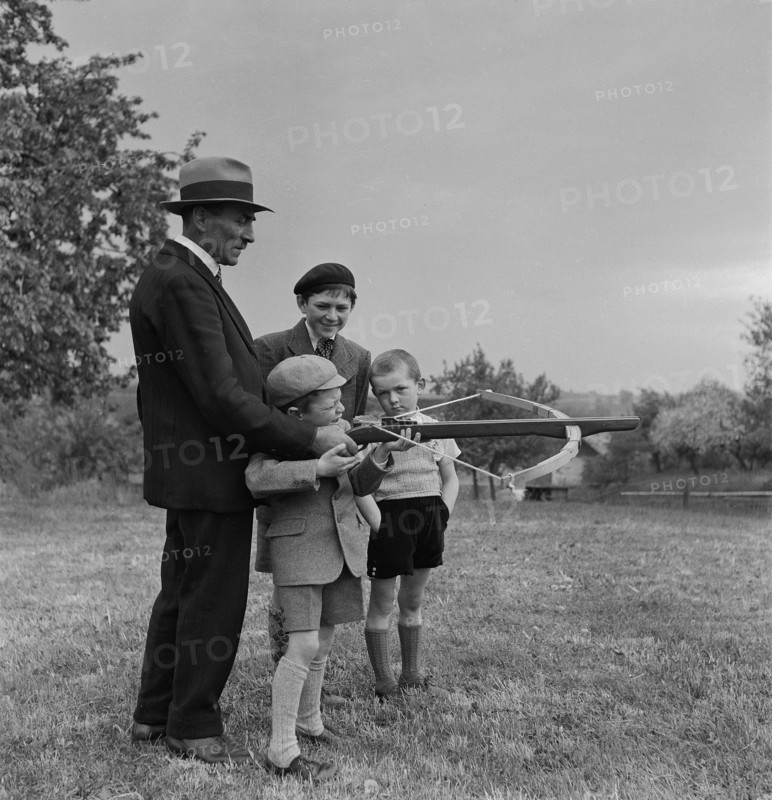Boys shooting with the crossbow, 1944.