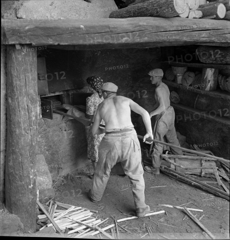 Men baking bread in St. Luc, Valais, in 1941.