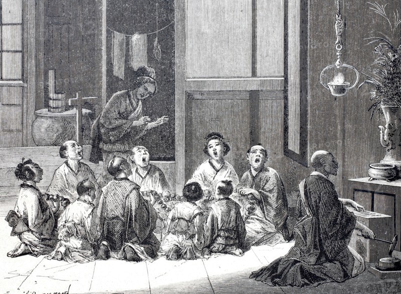 Japanese family gathered for prayer.