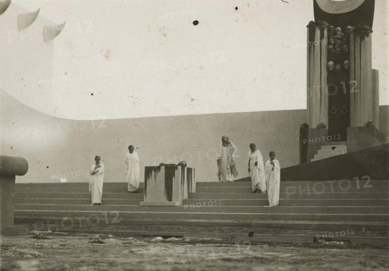 Actors on stage at the Greek Theatre of Syracuse. 
	
		1924
