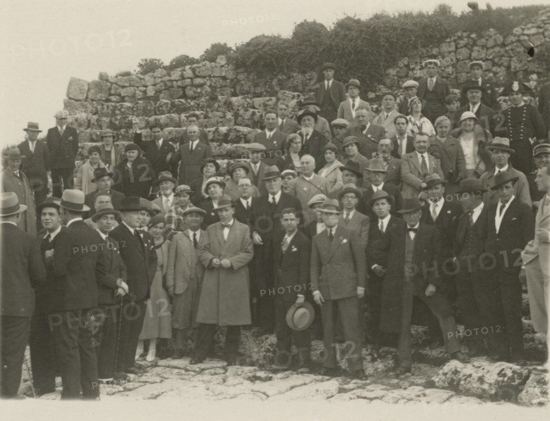 Group portrait at the archaeological site of Syracuse. 
	
		1924