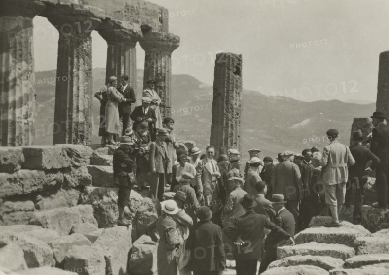 Members of the Touring Club Italiano  in the Temple of Juno in Agrigento. 
	
		1924