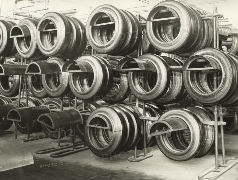 Tires awaiting vulcanization at the Pirelli plant in Milan's Bicocca district.. 1969