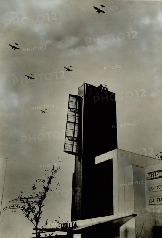 The II Atlantic Squadron flies over the Italian pavilion at the Chicago Exposition on the occasion of the Tenth Anniversary Air Cruise