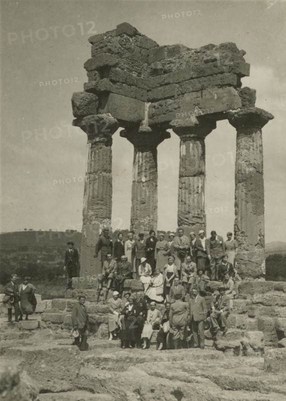 Touring Club Italiano Members in front of the Temple of the Dioscuri in Agrigento.