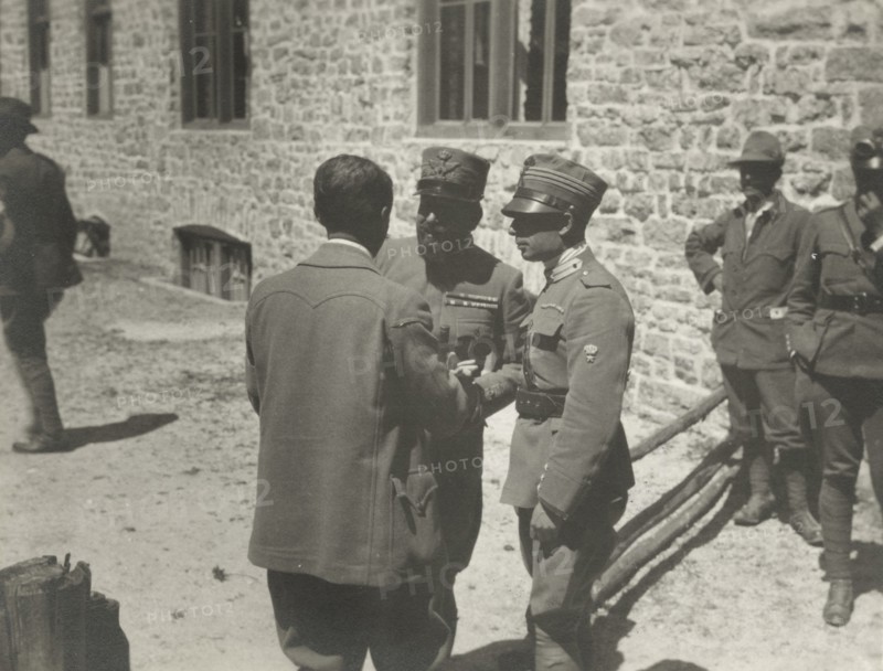Touring Club member with two officers of the First Army.