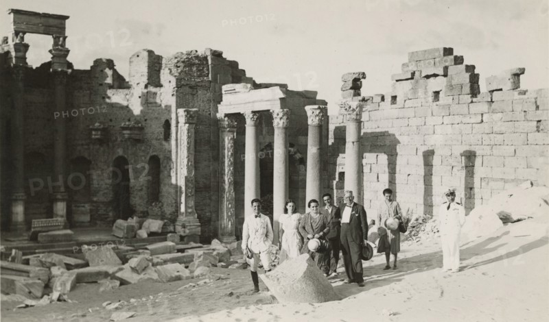 Excursionists in the Basilica of the Severi in Leptis Magna. 
	
		1931