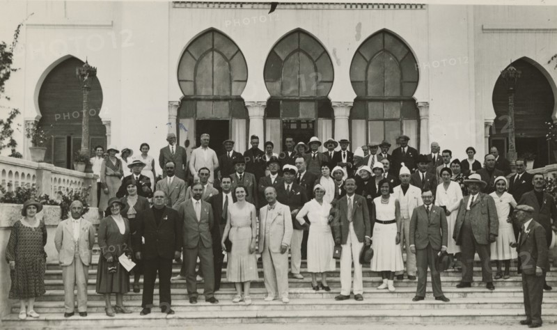 Excursionists at the entrance to the Grand Hotel in Tripoli. 
	
		1931