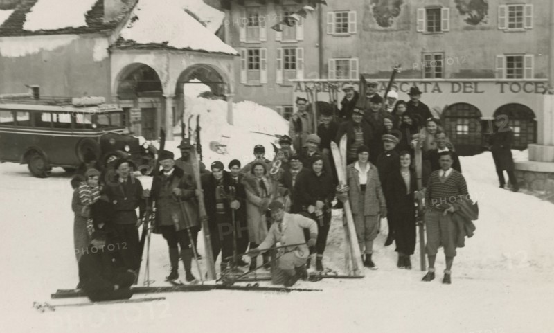 A group of skiers in front of the Cascata del Toce Hotel. 1931