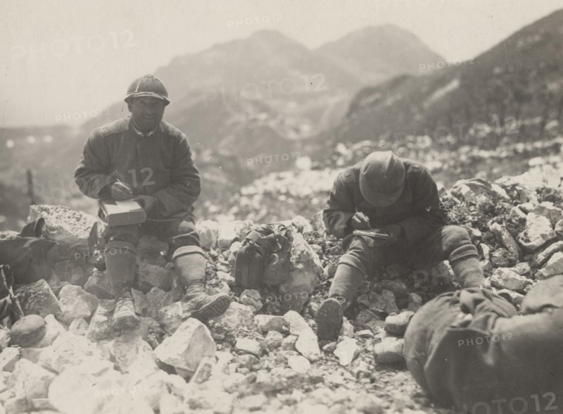 Soldiers on Monte Grappa writing to their families.