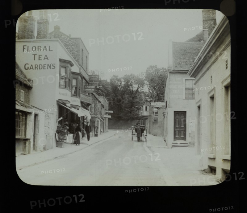Shops and tea gardens advertised on buildings, Pegwell Bay, Ramsgate, c 1900 the building on the right is now the Belle Vue Tavern.